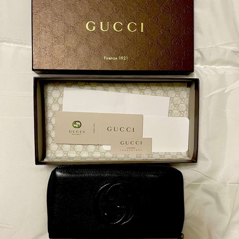 Gucci black wallet for sell. No longer want in my collection.